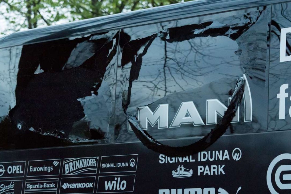 A view on the damaged windows of the Borussia Dortmund's team bus after it was hit by three explosions in Dortmund, Germany, on April 11, 2017. Dortmund's team bus was on its way to the stadium ahead of the UEFA Champions League soccer match between Borussia Dortmund and AS Monaco. Photo: EPA