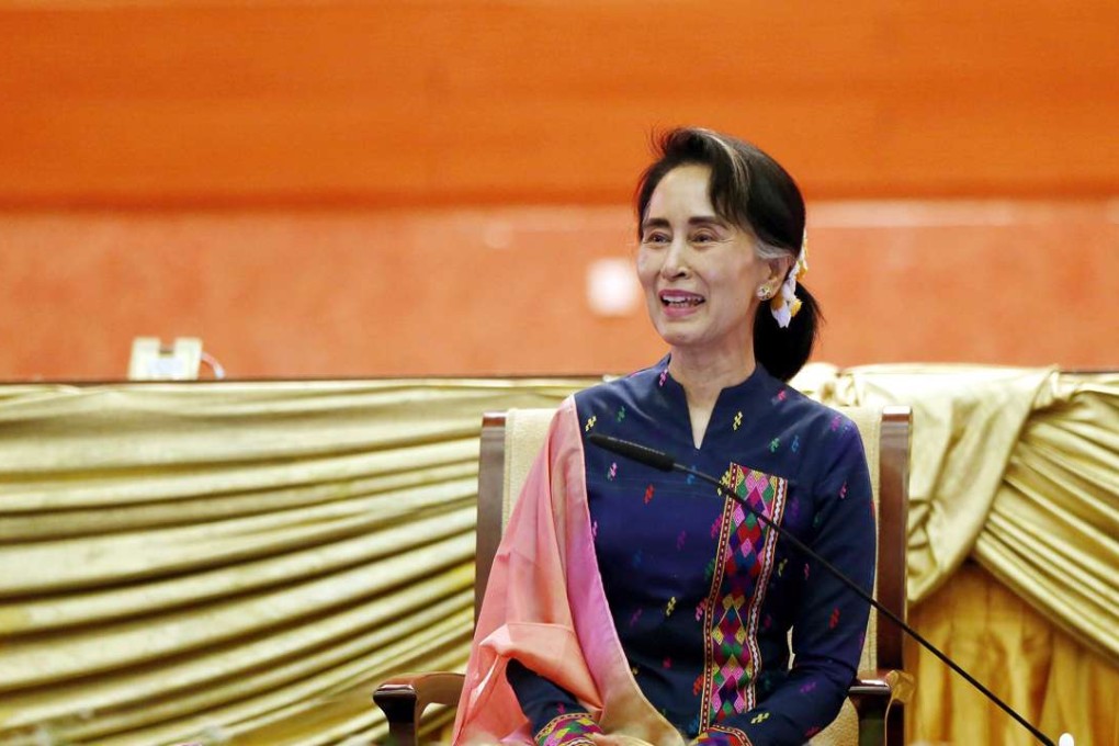 Myanmar's State Counsellor Aung San Suu Kyi speaks at a peace talk conference with Myanmar rural youth at the Myanmar Convention Centre - 2 in Naypyitaw, Myanmar. High hopes in the last year have dimmed as Suu Kyi has been criticised internationally for failing to stop aggression by the army and Burman majority against the Rohingya. Photo: EPA