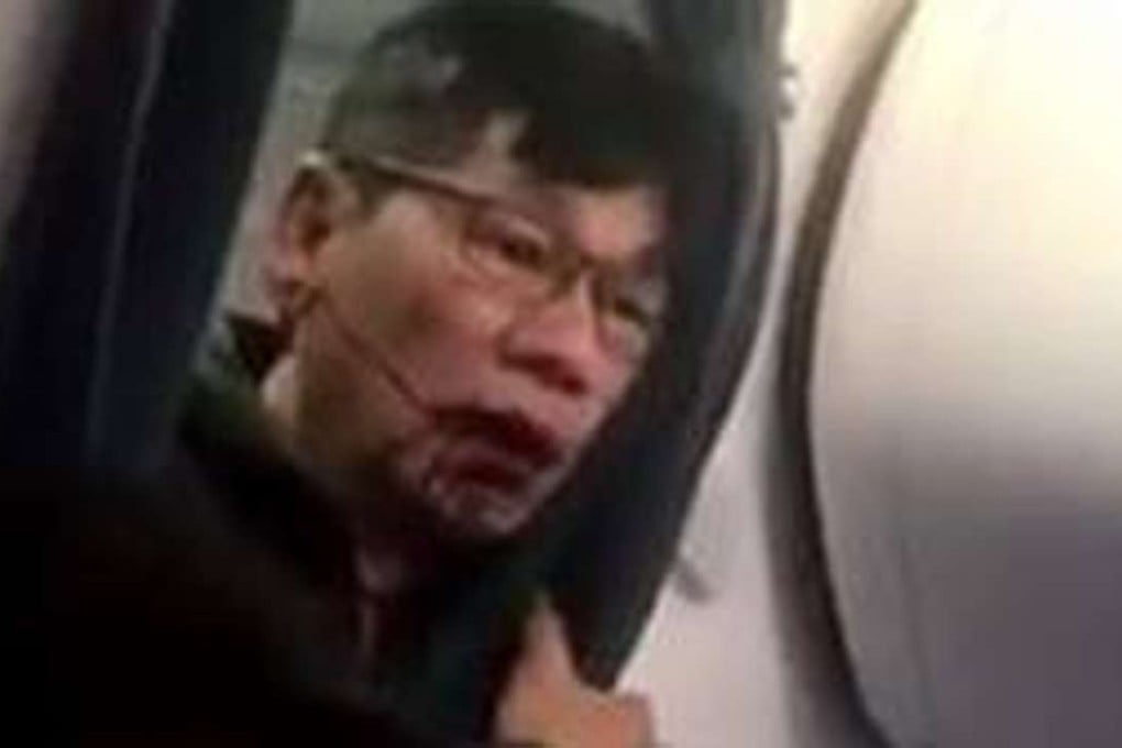 Dr David Dao is seen bloodied and dishevelled after dashing back onboard a United Airlines flight from Chicago, having been violently dragged off the plane by security staff on Sunday because they airline overbooked the flight. Photos: Twitter