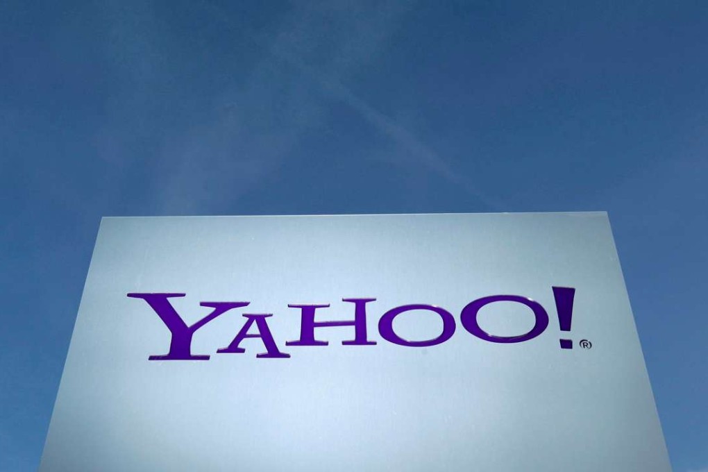 A Yahoo logo is pictured in front of a building in Rolle, Switzerland, as the search company was sued by a group of Chinese in US federal court. Photo: Reuters
