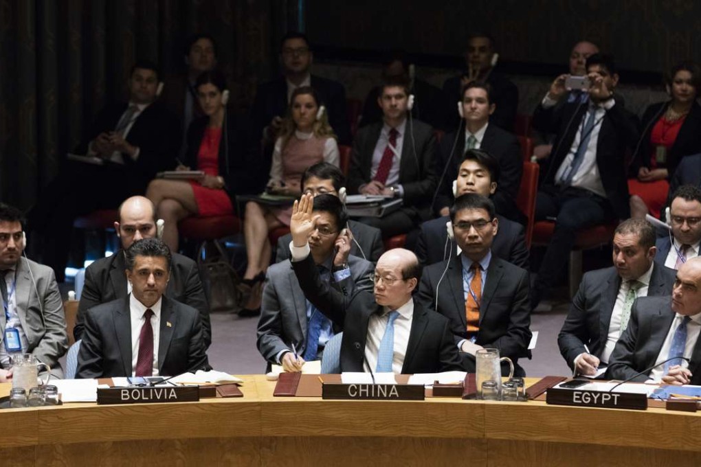 China’s UN envoy Liu Jieyi votes to abstain on a draft Security Council resolution at the UN headquarters in New York on Wednesday. Photo: Xinhua