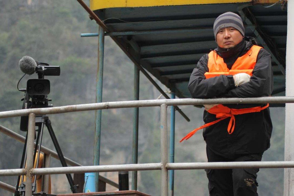 Chinese film director Xu Xin in a still from his documentary A Yangtze Landscape.
