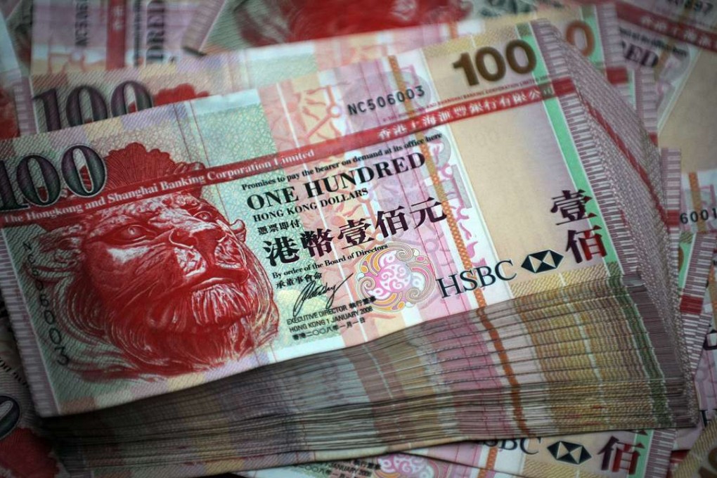 Higher Hong Kong dollar rates could lead to increased households debt, rising mortgage repayments, lower incomes and put downward pressure on consumption. Photo: AFP