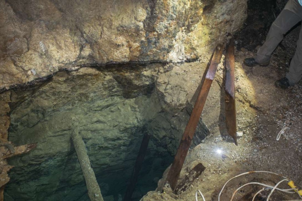 The interior of an old mining shaft at Needle Hill mine, located in Shing Mun Country Park, on February 24. The lower shaft is now completely filled with clear water. Photo: Antony Dickson