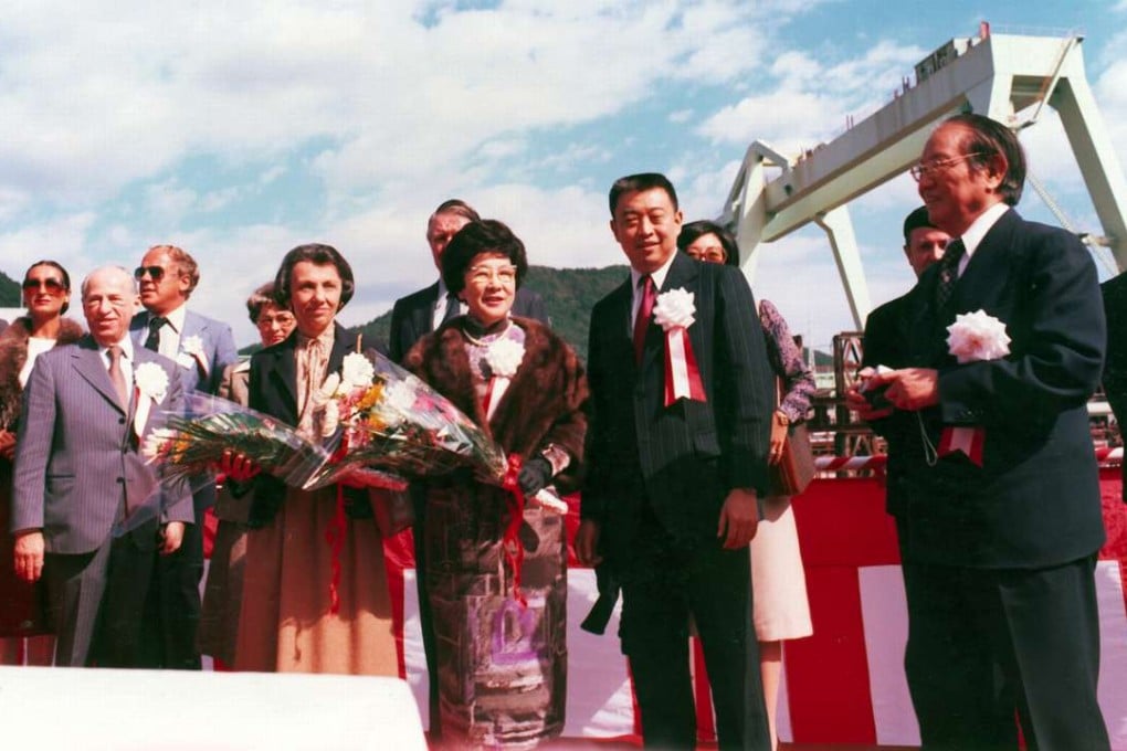 Tung Chao-yung (right) and his son Tung Chee-hwa (second right) attend the christening of Oriental Expert.