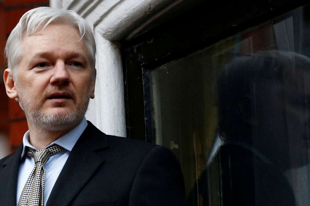 WikiLeaks founder Julian Assange, on the balcony of the Ecuadorian Embassy, in central London. Photo: Reuters