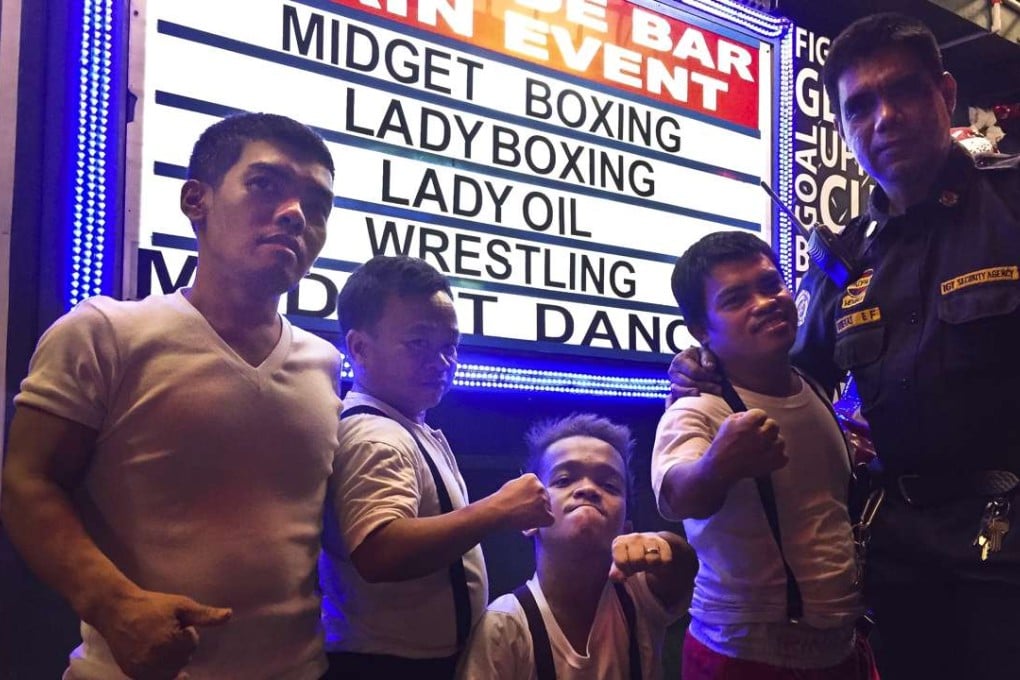Boxers outside the Ringside bar, in Manila. Pictures: Red Door News Hong Kong
