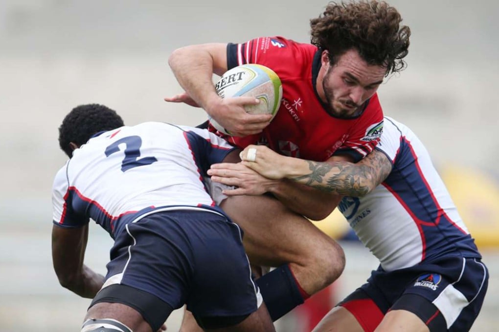 Hong Kong’s Jack Capon takes on the Philippines at the Asian Sevens Series in Malaysia. Photo: HKRFU