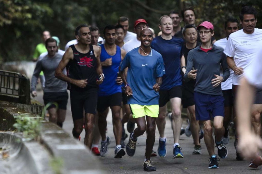 Mo Farah at the early-morning run on Bowen Road organised by Credit Suisse. Picture: Jonathan Wong
