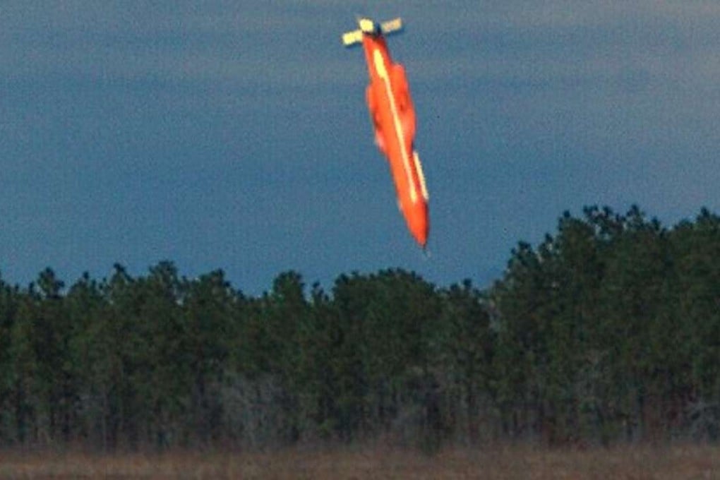 A file image dated March 11, 2003, shows a GBU-43/B Massive Ordnance Air Blast bomb moments before impact in an undisclosed location. Photo: AFP