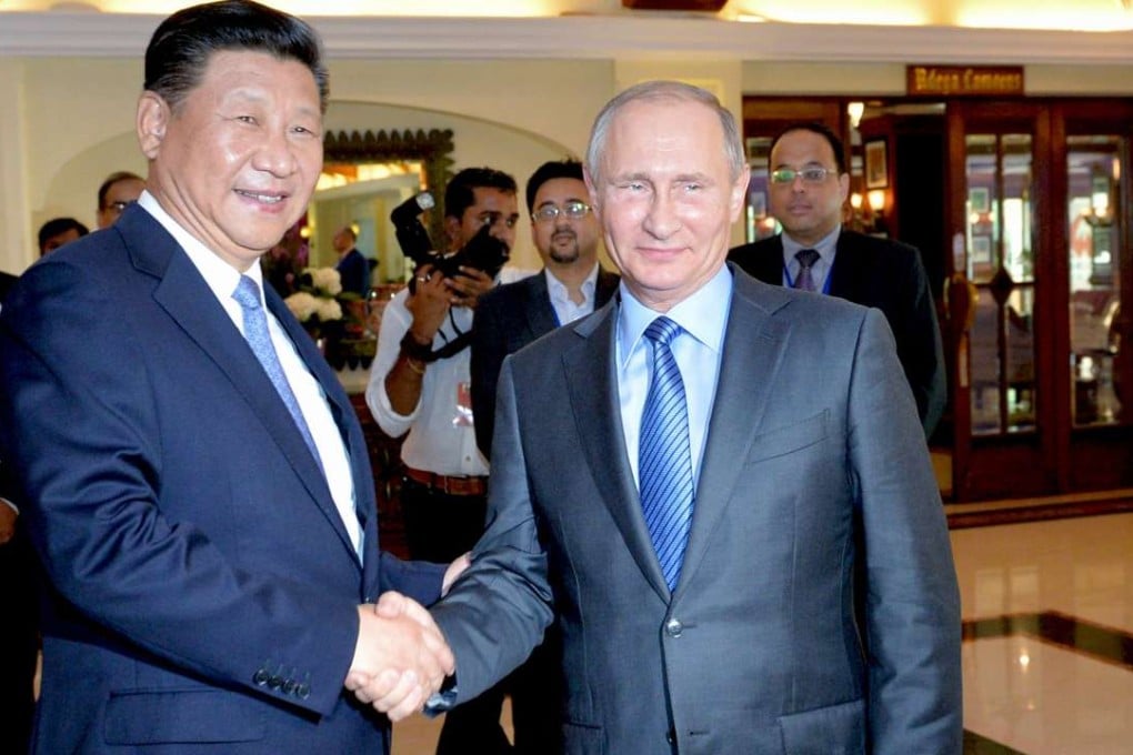 President Xi Jinping and his Russian counterpart, Vladimir Putin, at the BRICS (Brazil, Russia, India, China and South Africa) annual summit in the Indian state of Goa, last October 15. Recent military moves ordered by US President Donald Trump bear implications for China’s claim to a larger place in a world long-dominated by America, and for Putin’s reassertion of Russian geopolitical weight. Photo: AFP