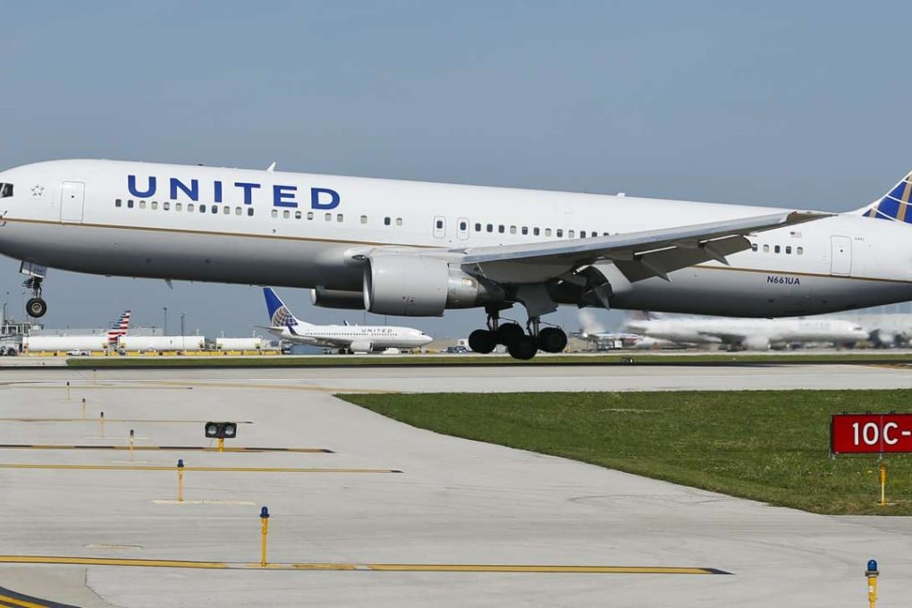 A United Airlines jet arrives at the O'Hare International Airport in Chicago. After forcibly removing a passenger last Sunday, the airline ended the week with a scorpion biting another passenger on its planes. Photo: EPA