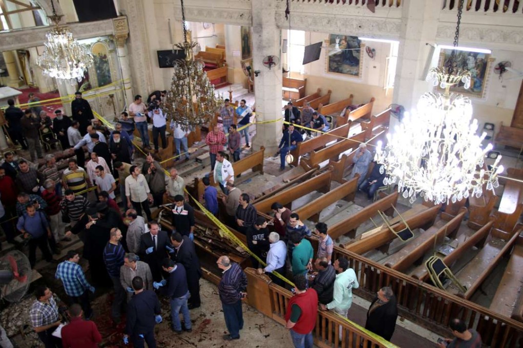 Security personnel investigate the scene of a bomb explosion inside Mar Girgis church in Tanta, north of Cairo, Egypt. Photo: EPA