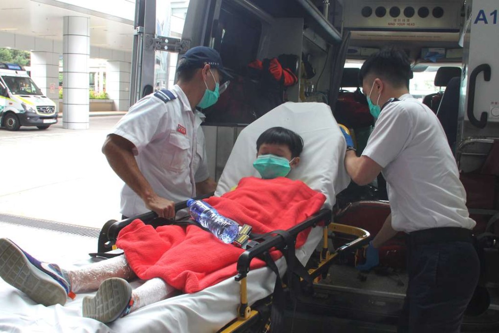 One of the injured children is taken to hospital. Photo: Handout