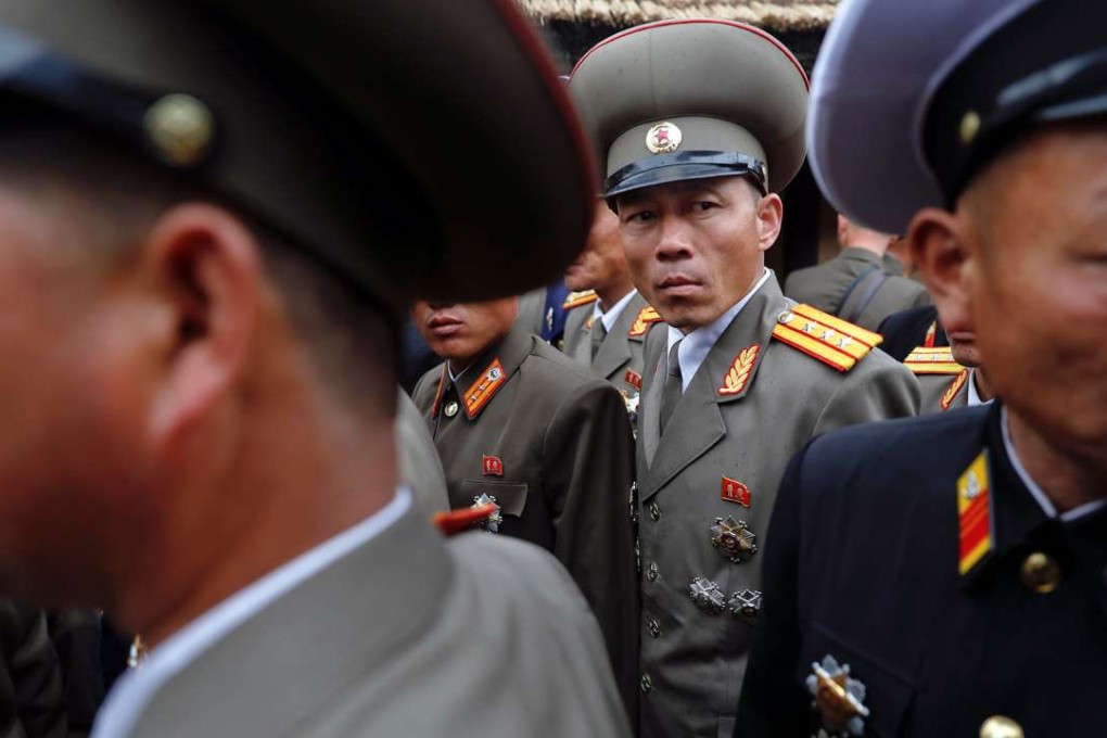 Military officers visit the birthplace of North Korean founder Kim Il-sung, a day before the 105th anniversary of his birth, in Mangyongdae, just outside Pyongyang, on Friday. Since North Korea does not have a slew of experts on US foreign policy to fully understand or to interpret Trump’s actions, chances are that it might misconstrue that ostensible sabre-rattling and overreact. Then what? Photo: Reuters