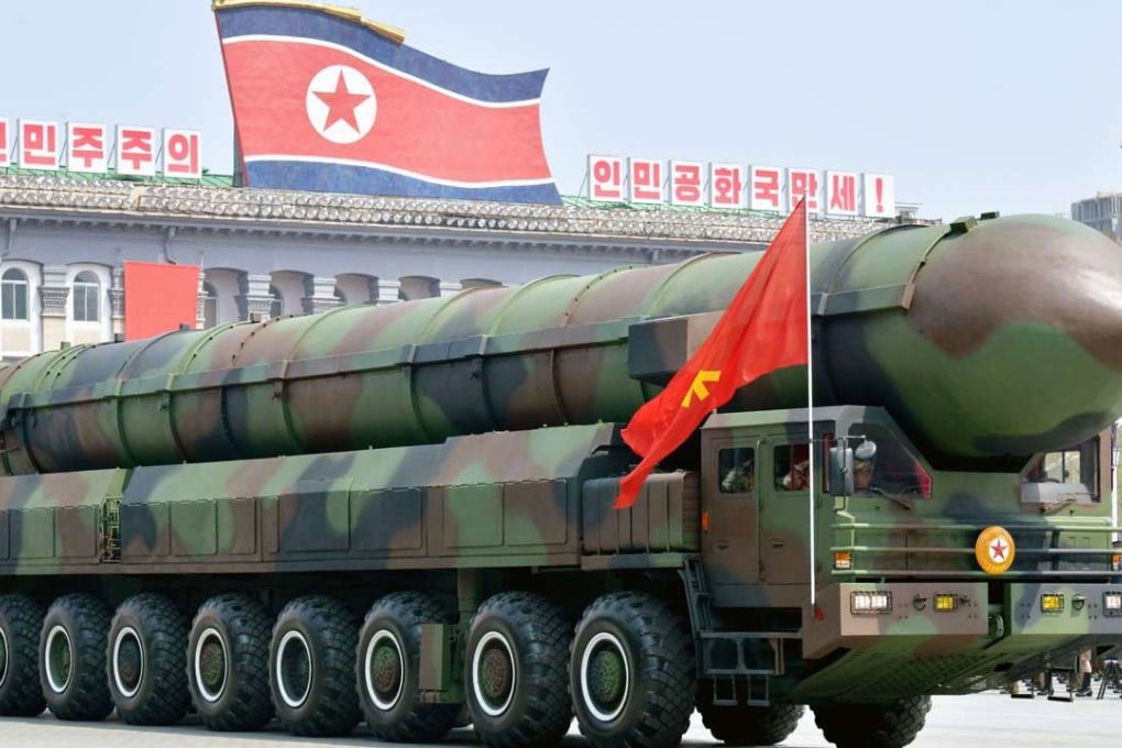 A vehicle equipped with a launch tube possibly for new intercontinental ballistic missiles is seen during a military parade at Kim Il-sung Square in Pyongyang. Photo: Kyodo