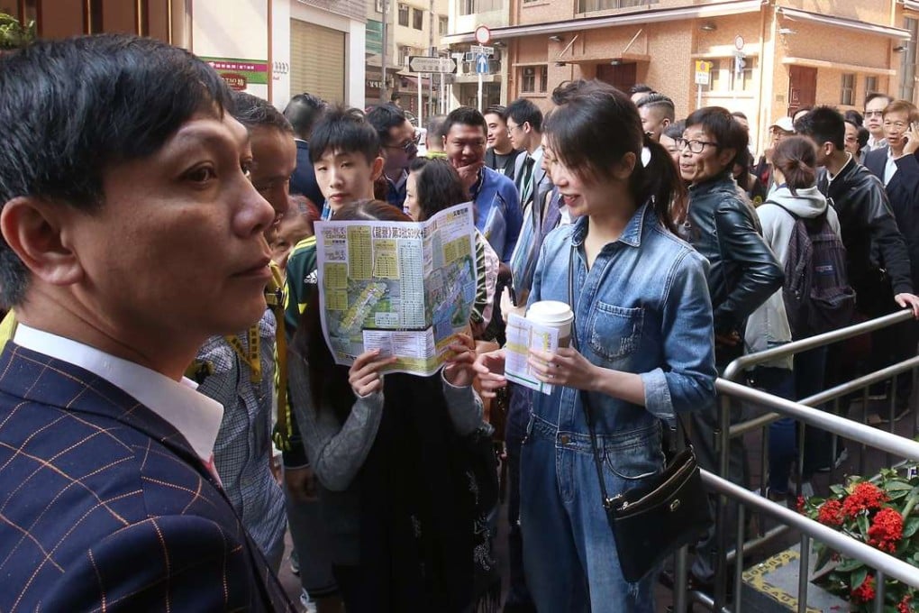 Potential buyers at the sales office of Vibe Centro in Tsim Sha Tsui. Photo: David Wong