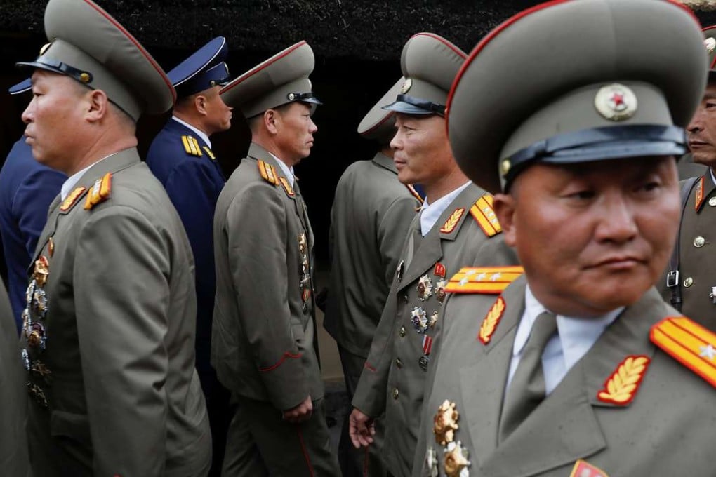 Military officers visit the birthplace of North Korean founder Kim Il-sung a day before the 105th anniversary of his birth just outside Pyongyang, North Korea. Photo: Reuters