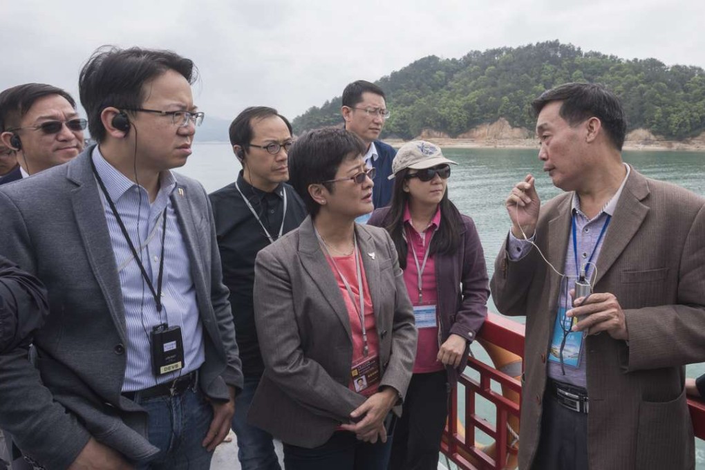 Lawmakers on a Legco delegation to the mainland take a boat trip to observe the Xinfengjiang Reservoir in Heyuan, Guangdong. Photo: ISD