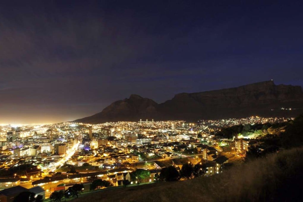 Cape Town lights up at dusk. Picture: Reuters