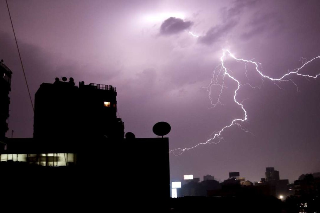 Storm clouds are gathering for global asset prices. Photo: AFP