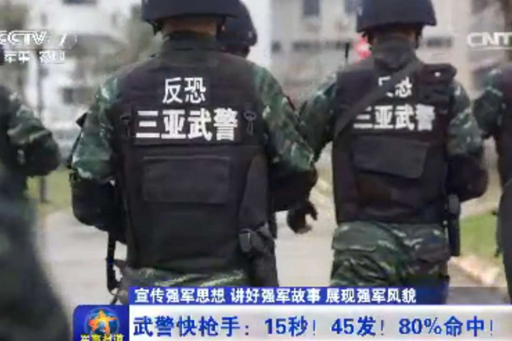 A screen grab from the report showing police taking part in the raid. Photo: CCTV