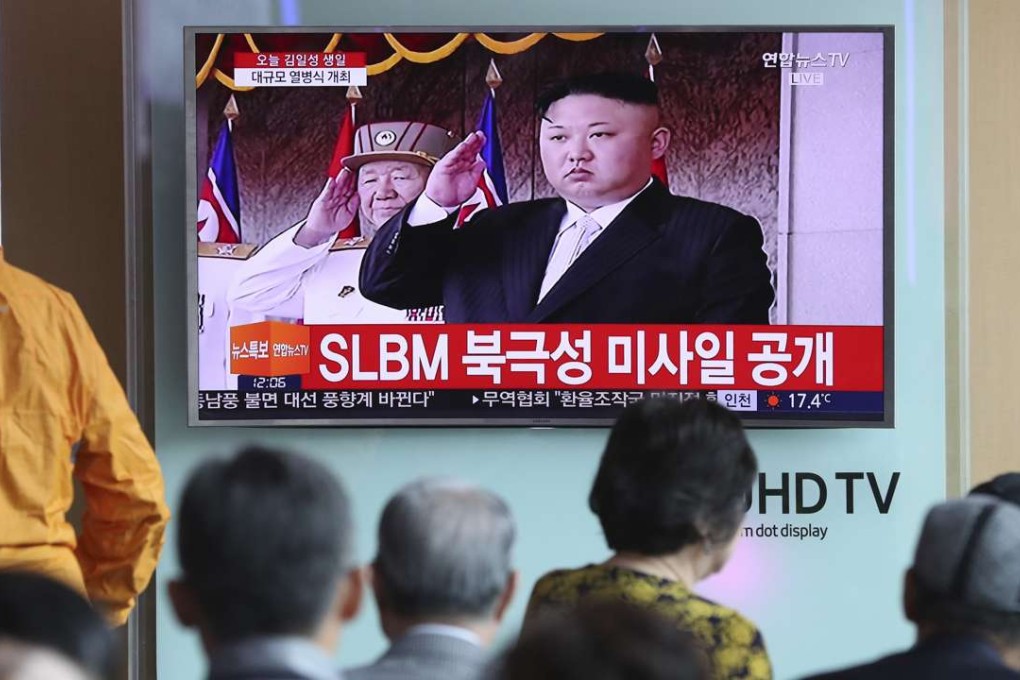 Commuters at the Seoul train station watch a live television broadcast of North Korean leader Kim Jong-un at a parade in Pyongyang on April 15. Seoul’s close proximity across the border, well within range of countless North Korean artillery batteries, has imbued in South Koreans an extreme aversion to war throughout seven decades of uneasy, often outright hostile, relations with their neighbour. Photo:AP