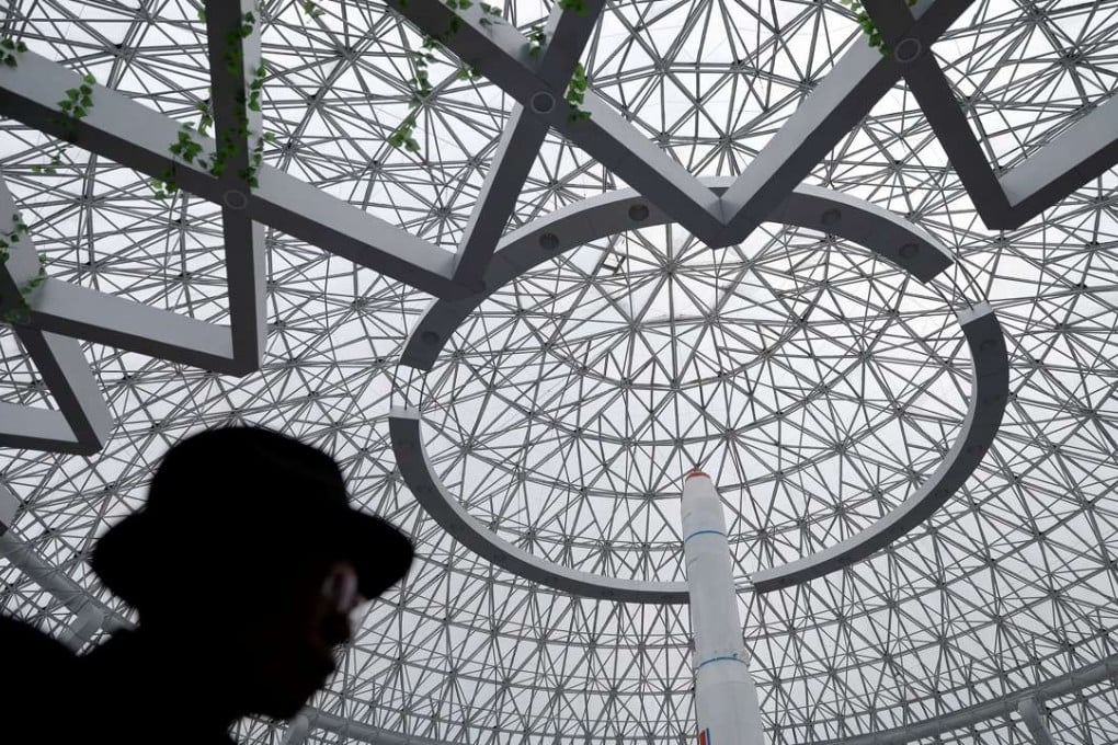 Geopolitical tensions on the Korean peninsula remain a potential risk factor this week. A man walks in front of a replica of Unha-3 rocket displayed at the Sci-Tech Complex in Pyongyang. Photo: Reuters