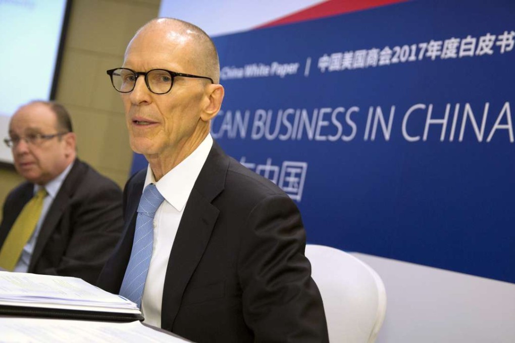 William Zarit, right, chairman of the American Chamber of Commerce in China, answers a question as Lester Ross, chairman of the chamber's policy committee, listens during a press conference in Beijing for the chamber's annual report on American business in China on Tuesday. Photo: AP