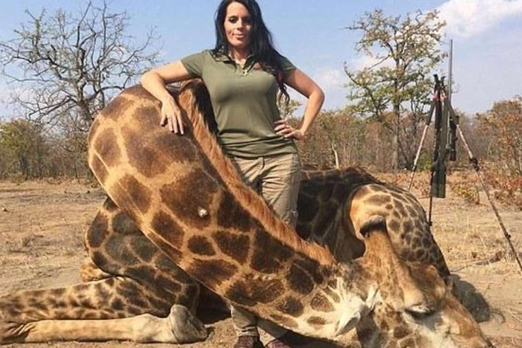 US hunter Sabrina Corgatelli poses with a giraffe she killed on an African hunt. "I couldn't be any happier!!" she said in a Facebook post about the 2015 kill. Photo: Facebook