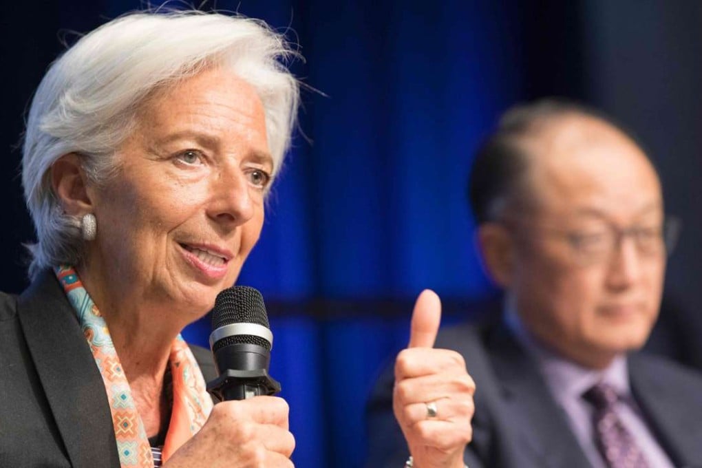 International Monetary Fund Managing Director Christine Lagarde (L) and World Bank President Jim Yong Kim (R) share a stage at the Parliamentary Town Hall at the IMF/World Bank Spring Meetings at the World Bank. The IMF said a resilient Chinese economy will help support global economic growth in 2017. Photo: AFP