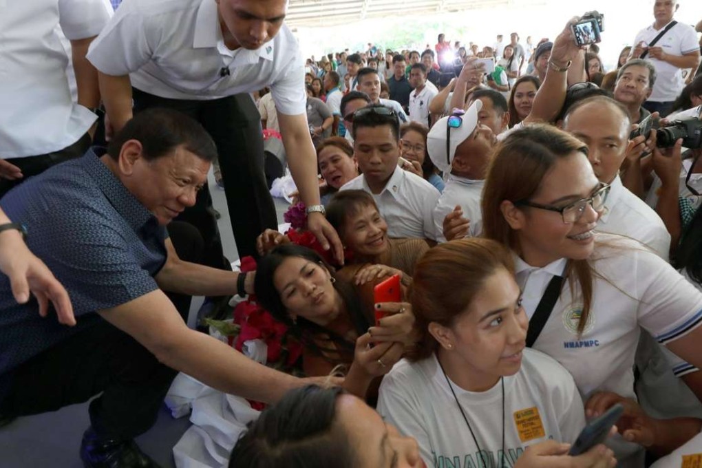 Duterte, who is known for his tough stance on drugs and colourful language, enjoys the support of 78 per cent of the Philippine people, especially the lower and middle classes. Photo: EPA