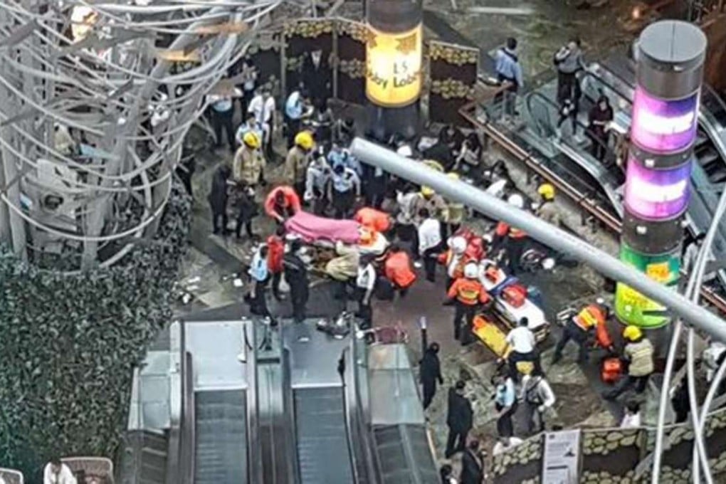The Hong Kong’s tallest escalator at Langham Place mall in Mong Kok suddenly kicked into reverse on March 25, dumping shoppers quickly to the ground. Photo: Facebook