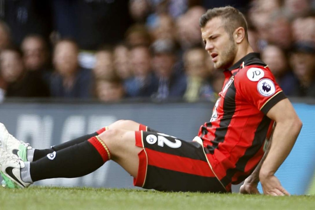 Bournemouth's Jack Wilshere after being injured playing against Tottenham. Photos: Reuters