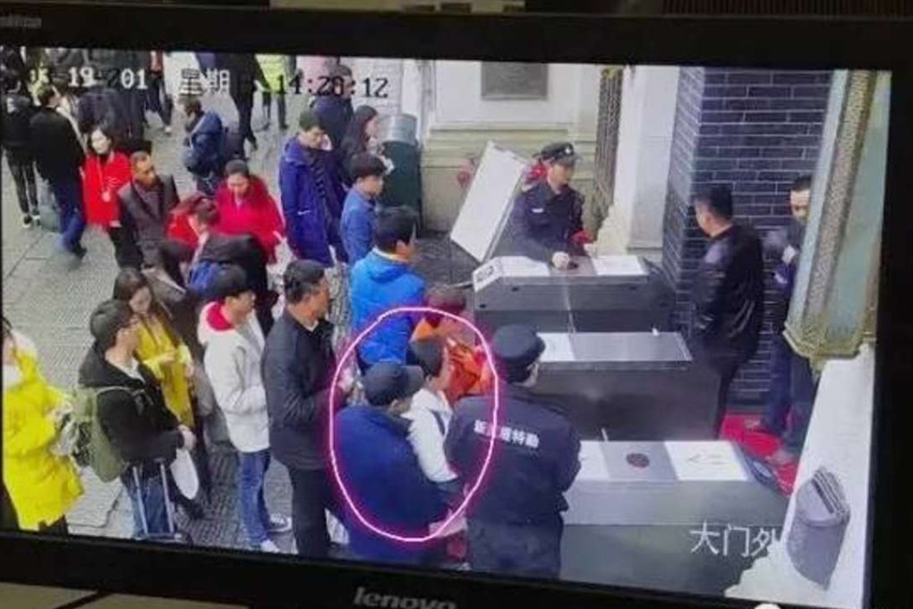 Surveillance footage shows the suspect appearing to steal a mobile phone. Photo: Handout