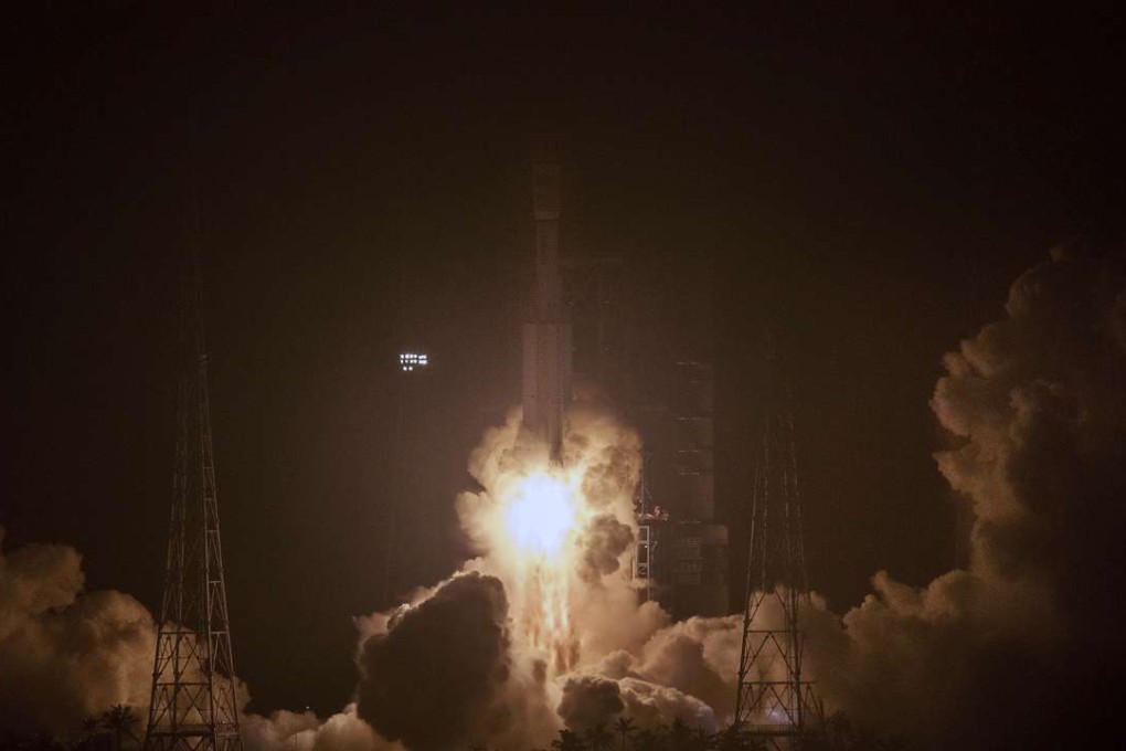 A Long March 7 rocket carrying the Tianzhou-1 cargo spacecraft blasts off from the Wenchang launch centre on Hainan. Photo: AP