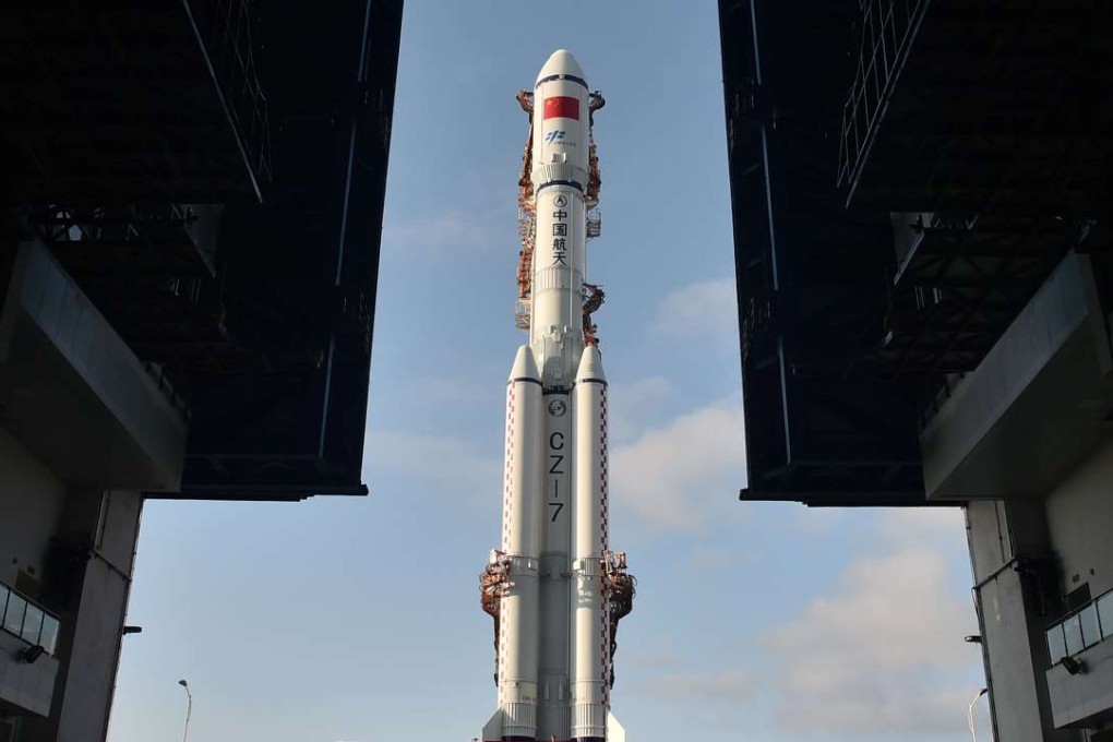 The Long March-7 rocket and Tianzhou-1 cargo spacecraft are seen as they are transferred to a launching spot in Wenchang, Hainan province, China, April 17, 2017. Photo: Reuters