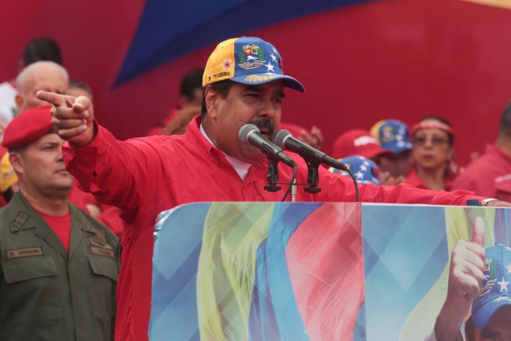 Handout picture released by the Venezuelan presidential office showing President Nicolas Maduro addressing his supporters during a rally in Caracas. The country is one of the biggest donors to the inauguration of President Donald Trump last January, plunking down US$500,000. Photo: AFP