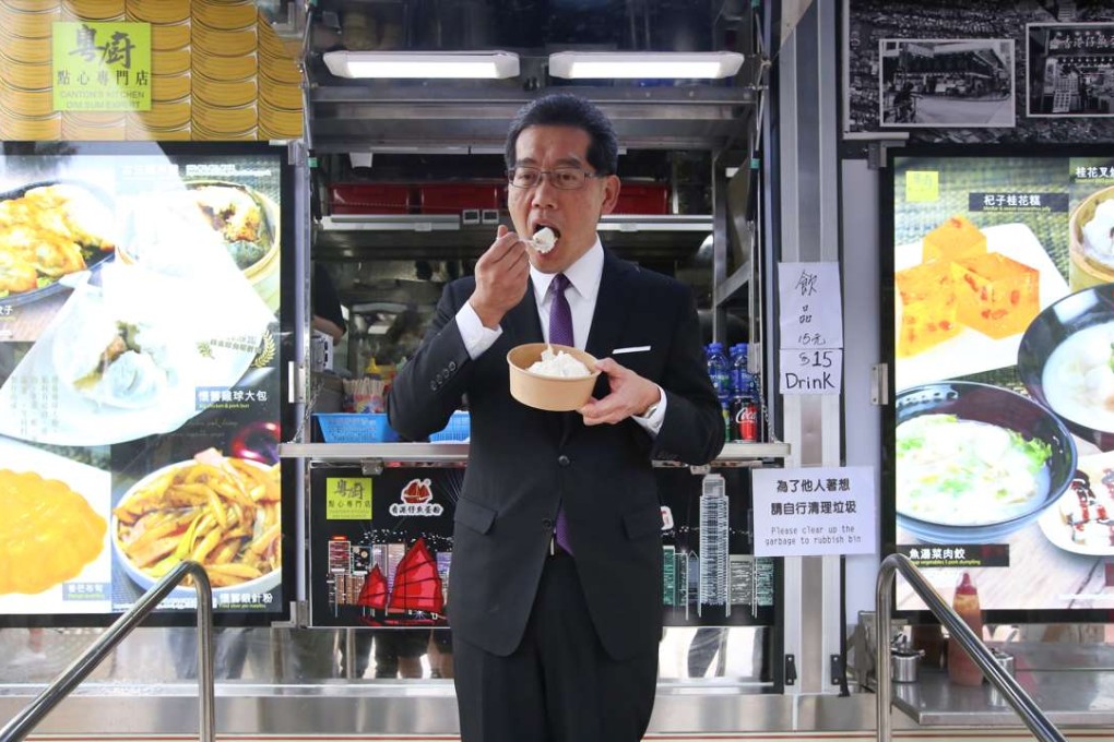 Greg So tries some of the food available from a truck at the Disneyland site. Photo: Sam Tsang