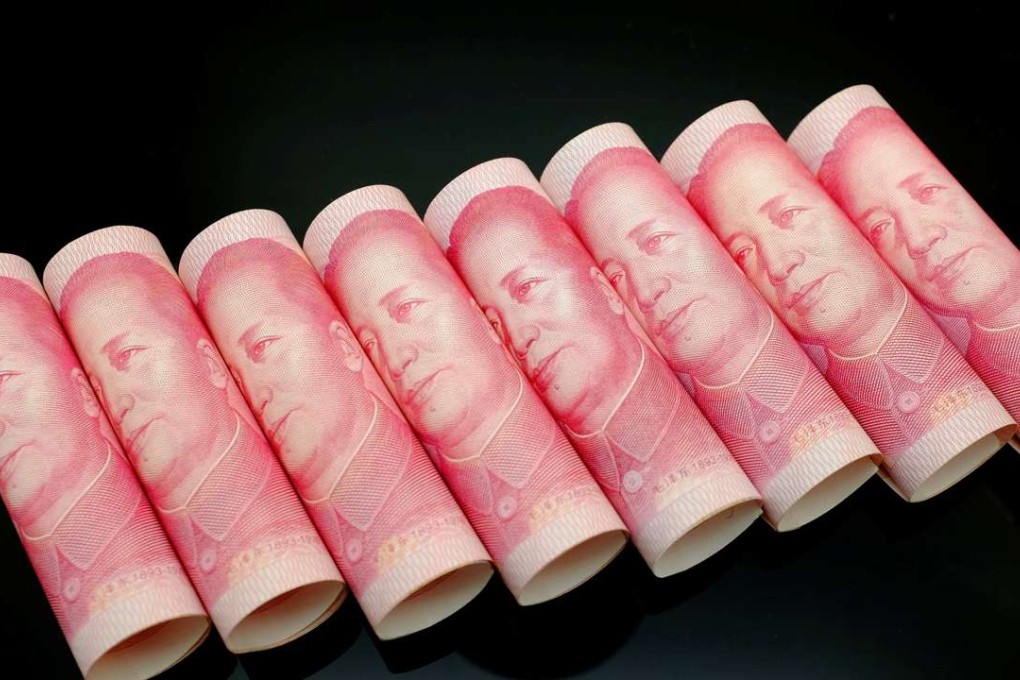 In the spot market in Shanghai, the US dollar bought 6.88 yuan at 2pm, down 0.03 per cent from 6.8822 late Thursday. Photo: Reuters