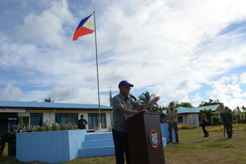 Philippine Defence Secretary Delfin Lorenzana delivers a speech during a visit to Thitu Island in the Spratlys on Friday. Photo: AFP