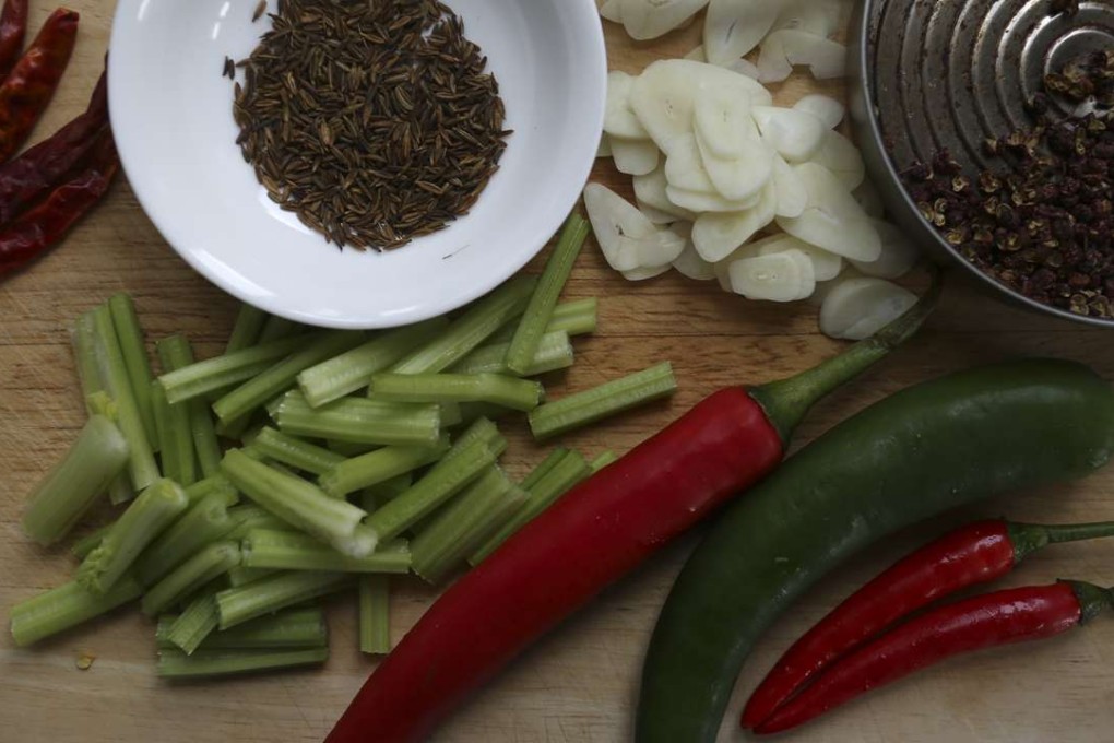 Ingredients for making stir-fried lamb kidneys with cumin and Sichuan peppercorn. Photography: Jonathan Wong. Styling: Nellie Ming Lee