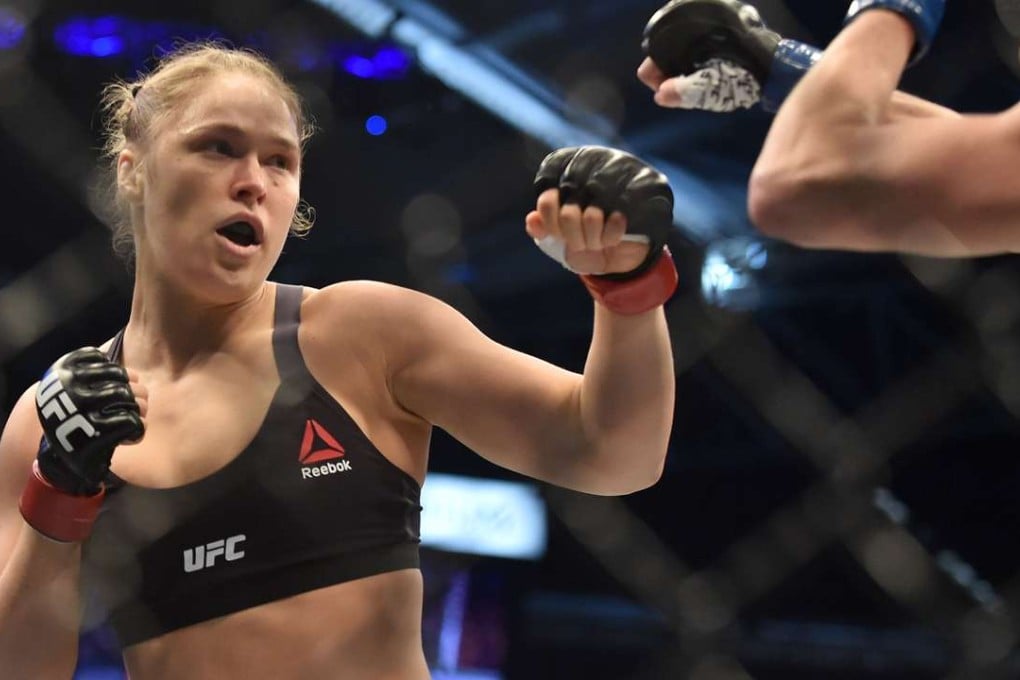 Ronda Rousey, whose MMA career has hit the rocks recently, has announced that she is engaged to her partner Travis Browne. Photo: AFP
