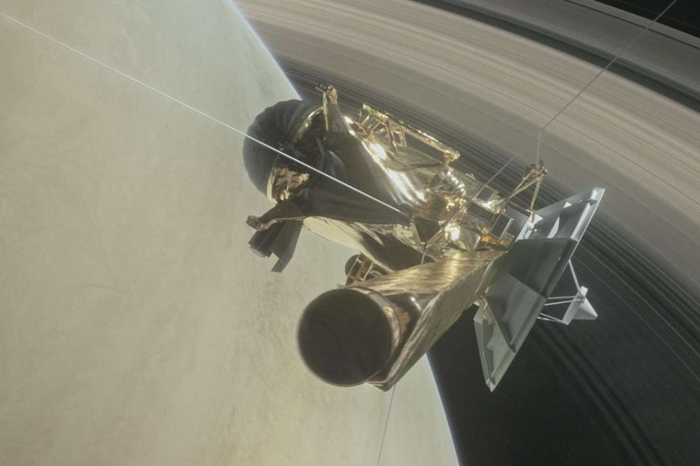 A handout photo made available by NASA shows an illustration of the Cassini spacecraft about to make the first in a series of 22 dives through the 2,400 km gap between Saturn and its rings next week as part of its mission's grand finale. The spacecraft will then end its expedition on September 15, 2017, with a final plunge into the gas giant. Photo: EPA