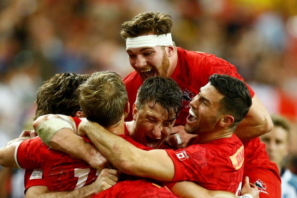 Canada players celebrate their victory in Singapore. Photo: Reuters