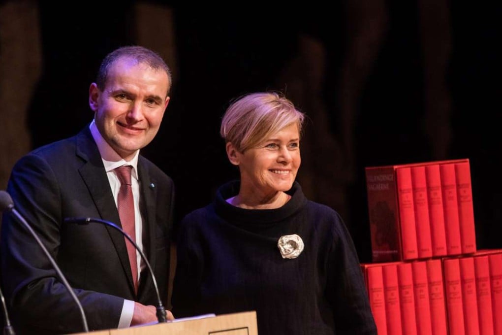 Iceland's President Gudni Thorlacius Johannesson (L) and Danish Minister of Culture Mette Bock (R) during the presentation of 'The National Gift - The Complete Sagas of Icelanders', which was translated into Danish, in the Danish Royal Library in Copenhagen, Denmark. There are rising concerns the Icelandic language may be under threat in the years ahead. Photo: EPA