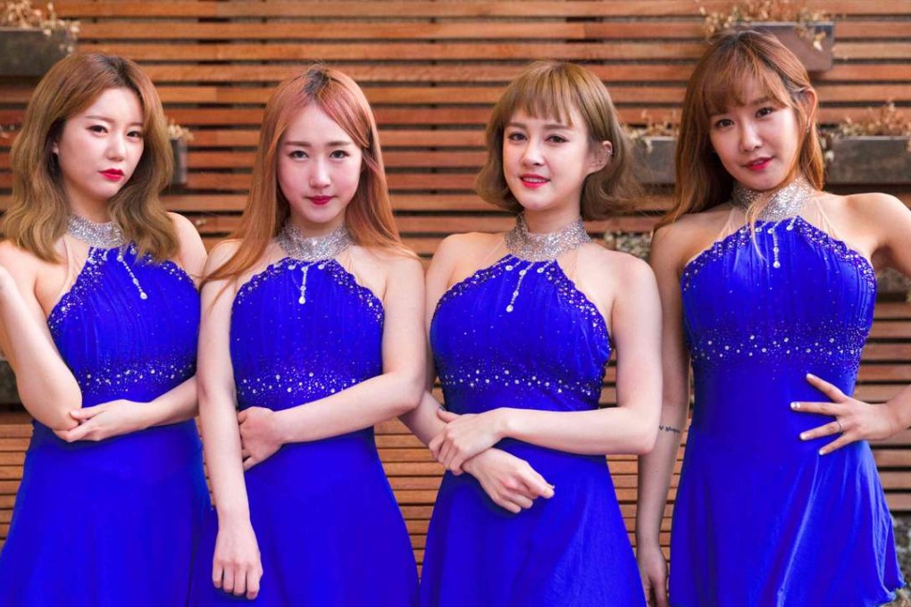 All members of K-pop outfit SixBomb went through extensive plastic surgery, from nose jobs to breast implants, before releasing their new single on March 16. Cosmetic surgery is becoming more popular among young people. Photo: AFP