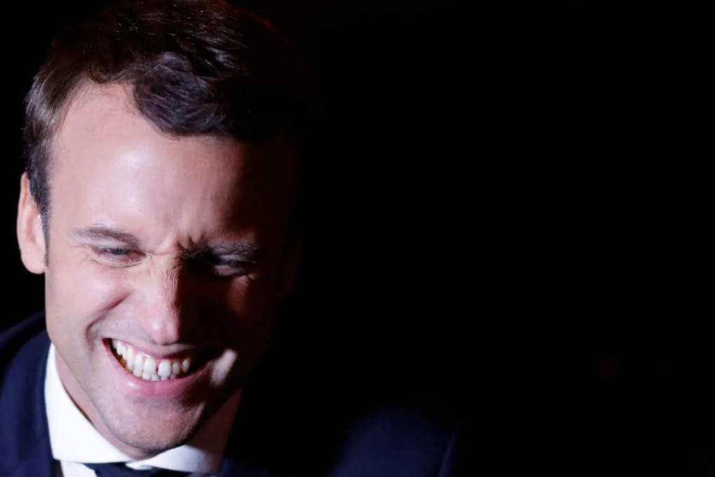 Emmanuel Macron, head of the political movement En Marche ! leaves his campaign headquarters in Paris after early results in the first round of the French presidential election showed him advancing to the runoff. Photo: Reuters