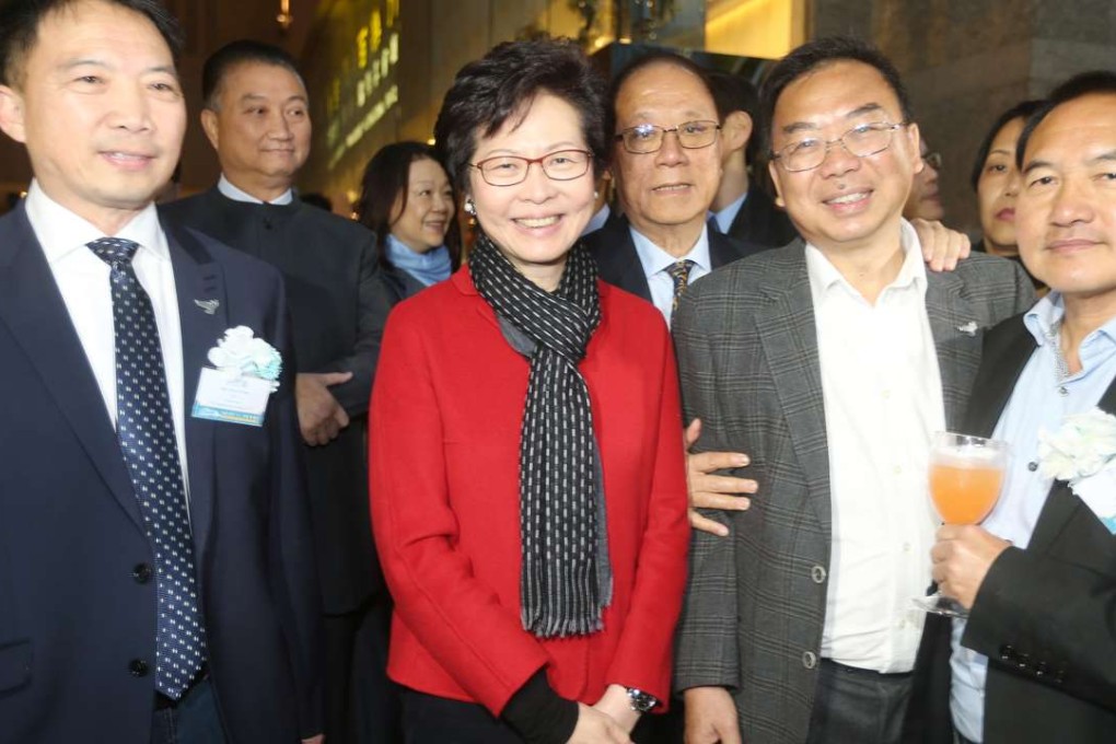 Then chief executive candidate Carrie Lam Cheng Yuet-ngor with Democratic Party chair Wu Chi-wai (far left) and other prominent members at the party’s 20th anniversary cocktail reception in Kowloon Bay on March 17. Photo: K. Y. Cheng