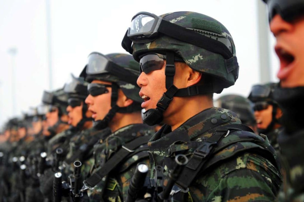 Chinese paramilitary policemen taking part in an anti-terrorism rally in Kashgar in Xinjiang on the route of the ancient Silk Road. Photo: Reuters